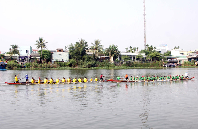 热闹非凡的广南省三岐河划船比赛 ảnh 1