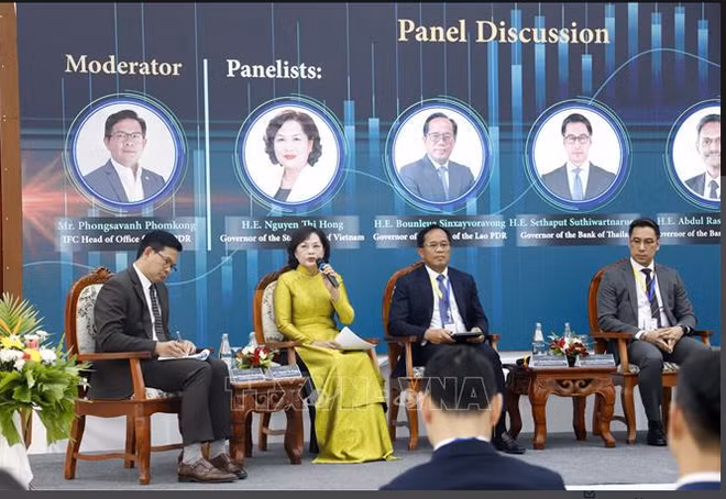 越南国家银行行长出席国际货币基金组织在老挝举办的研讨会 ảnh 1
