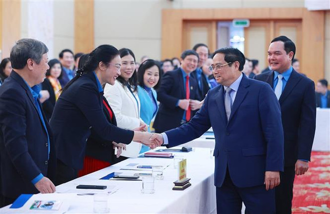 越南政府总理范明政：着力落实三项核心任务 提升职工的生活水平 ảnh 1