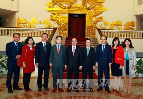 政府总理阮春福会见韩联社社长朴鲁晃 ảnh 2 政府总理阮春福会见韩联社社长朴鲁晃 ảnh 2