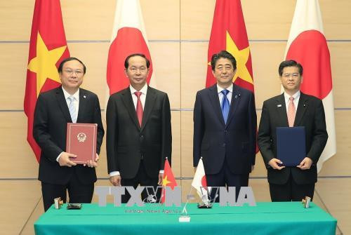 越南国家主席陈大光与日本首相安倍晋三举行会谈 ảnh 3 越南国家主席陈大光与日本首相安倍晋三举行会谈 ảnh 3