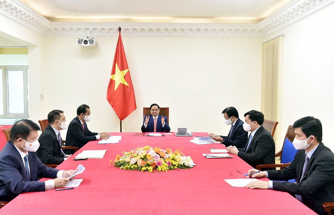 越南政府总理范明政与德国总理默克尔通电话 ảnh 1 越南政府总理范明政与德国总理默克尔通电话 ảnh 1