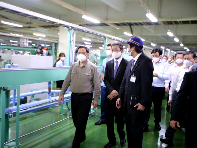 越南政府总理范明政赴胡志明市视察疫情防控工作 ảnh 2