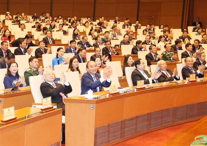 越南第十四届国会第九次会议圆满闭幕 通过了10项法律和21项决议 ảnh 2