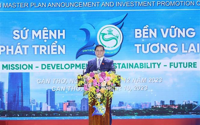 政府总理范明政出席芹苴市规划公布仪式 与永盛县选民接触 ảnh 1