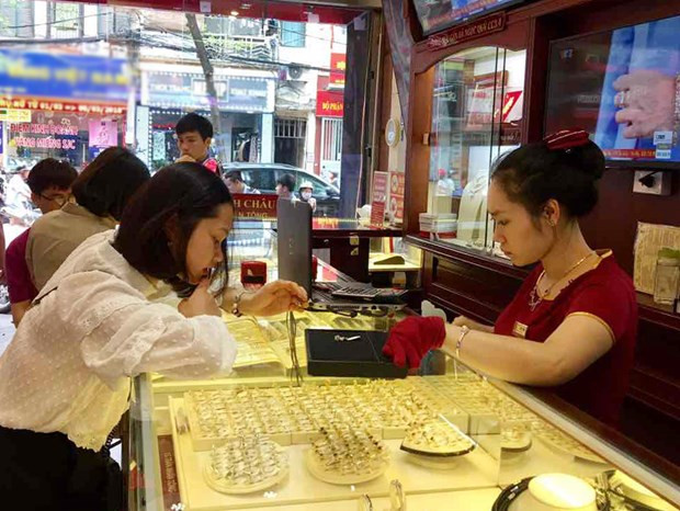 今日上午越南国内市场黄金价格每两下降10万越盾 ảnh 1