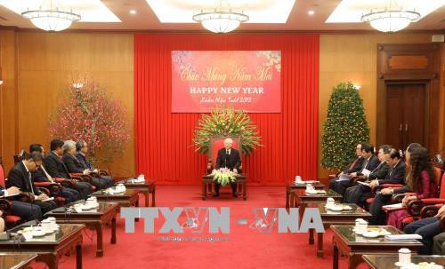 越共中央总书记阮富仲会见东盟各国驻越大使与代办 ảnh 1 越共中央总书记阮富仲会见东盟各国驻越大使与代办 ảnh 1