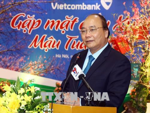 政府总理阮春福来到Vietinbank和Vietcombank两家银行拜年 ảnh 2