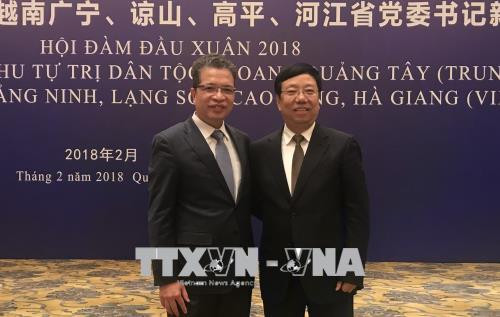 越南边境四省与中国广西党委书记举行新春会晤 ảnh 1 越南边境四省与中国广西党委书记举行新春会晤 ảnh 1
