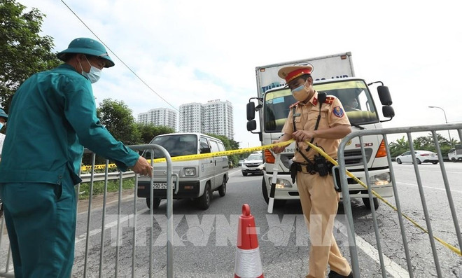 河内实施远程交通分流疏导方案 张贴“绿色通道”二维码车辆可直接通行 ảnh 1 河内实施远程交通分流疏导方案 张贴“绿色通道”二维码车辆可直接通行 ảnh 1