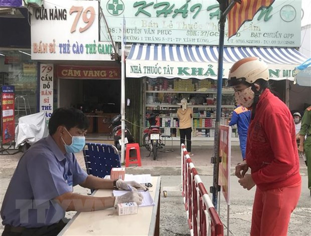 政府副总理武德儋就新冠肺炎疫情防控工作赴永隆省进行工作座谈 ảnh 1