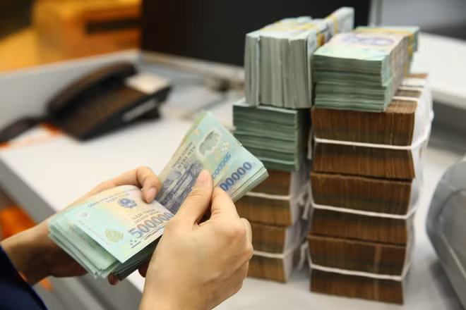 抓紧发放支持企业发工资的贷款资金 ảnh 1