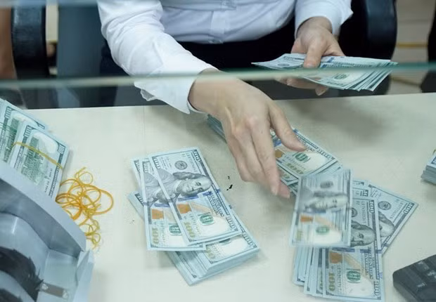 7月21日上午越盾对美元汇率中间价下调4越盾 ảnh 1