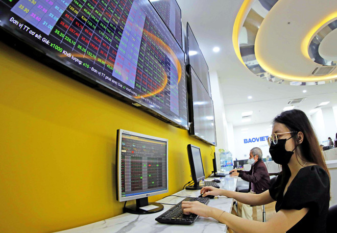 3月1日股市恢复上涨 Vn-Index上升9点 ảnh 1 3月1日股市恢复上涨 Vn-Index上升9点 ảnh 1