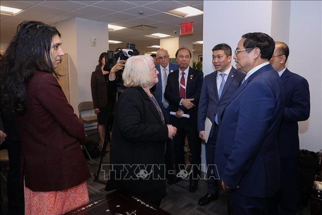 越南政府总理范明政与美国朋友进行亲切会面 ảnh 1