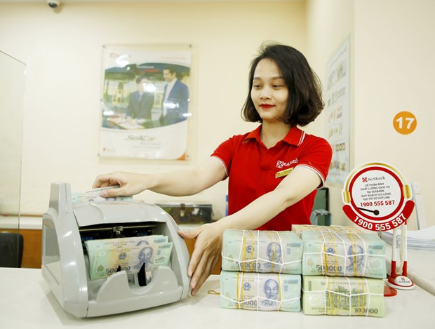 新加坡大华银行将越南2023年GDP增长预测下调至5% ảnh 3