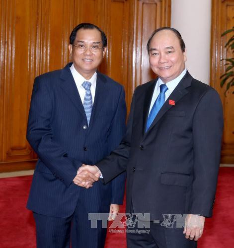 越南政府总理阮春福会见老挝计划投资部部长苏潘 ảnh 1 越南政府总理阮春福会见老挝计划投资部部长苏潘 ảnh 1
