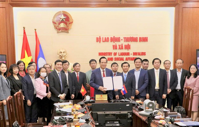 越南与老挝在劳务和社会福利领域进行合作 ảnh 1 越南与老挝在劳务和社会福利领域进行合作 ảnh 1