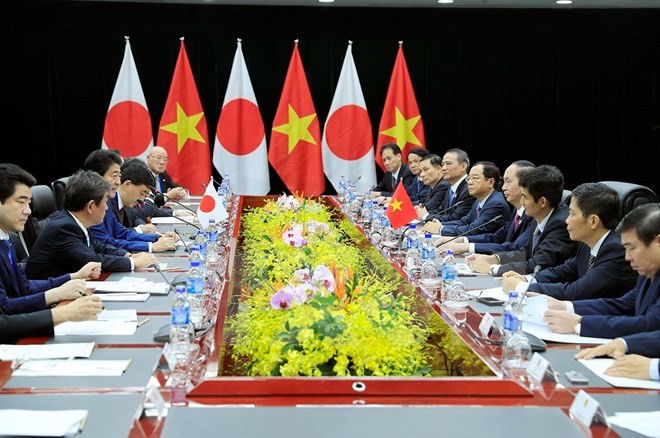 越南国家主席陈大光会见日本首相安倍晋三 ảnh 3