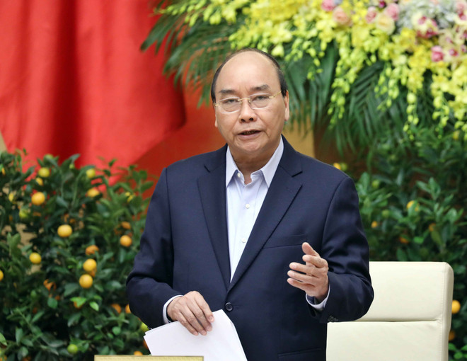 政府总理阮春福:多措并举降低新冠肺炎疫情对经济发展的影响 ảnh 1 政府总理阮春福:多措并举降低新冠肺炎疫情对经济发展的影响 ảnh 1