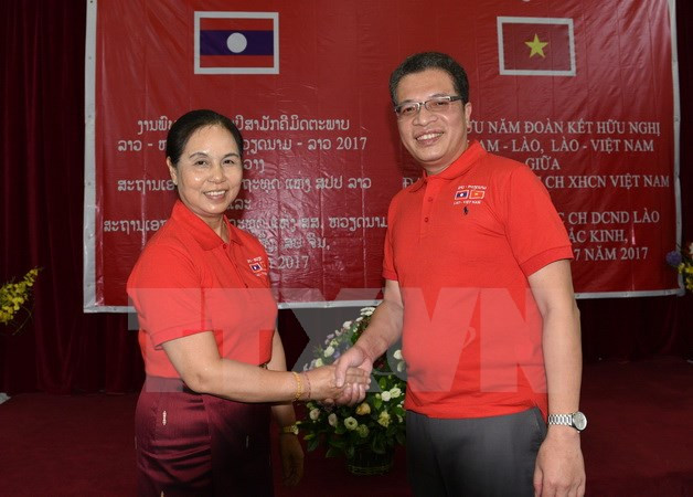 越老两国驻华大使馆举行交流活动 ảnh 1 越老两国驻华大使馆举行交流活动 ảnh 1