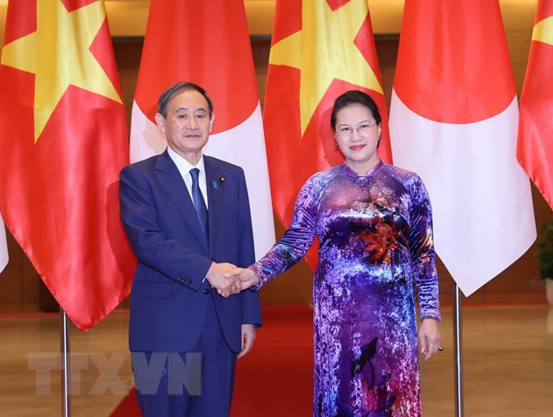 越南国会主席阮氏金银会见日本首相菅义伟 ảnh 1 越南国会主席阮氏金银会见日本首相菅义伟 ảnh 1