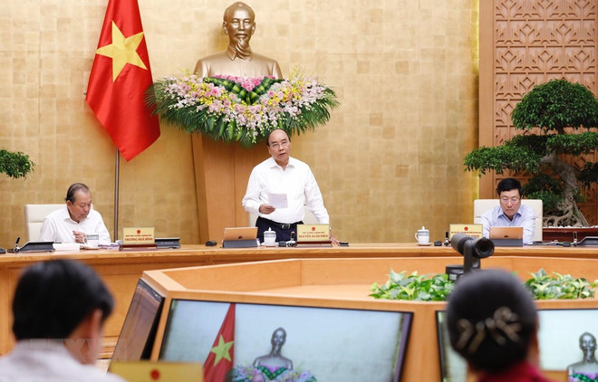 政府9月份例行会议的决议：各部门和地方同步展开所提出的各项措施努力完成各项任务 ảnh 1