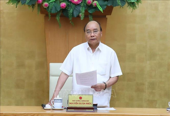 越南政府总理要求快速透明处理人员正当合理的出入境需求 ảnh 1