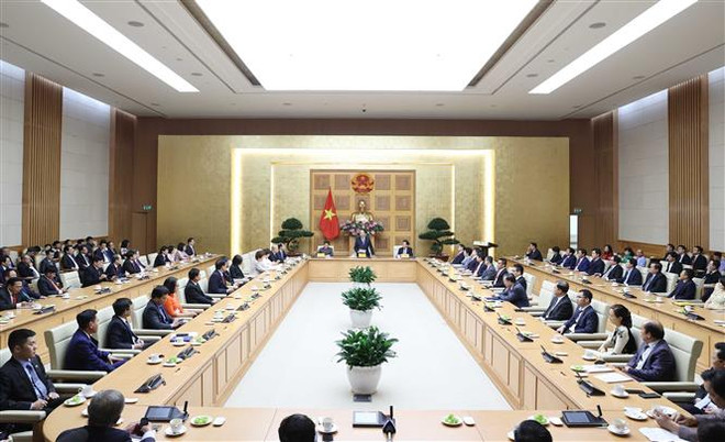 政府总理阮春福会见“2020年国家品牌奖”获奖企业代表 ảnh 2 政府总理阮春福会见“2020年国家品牌奖”获奖企业代表 ảnh 2