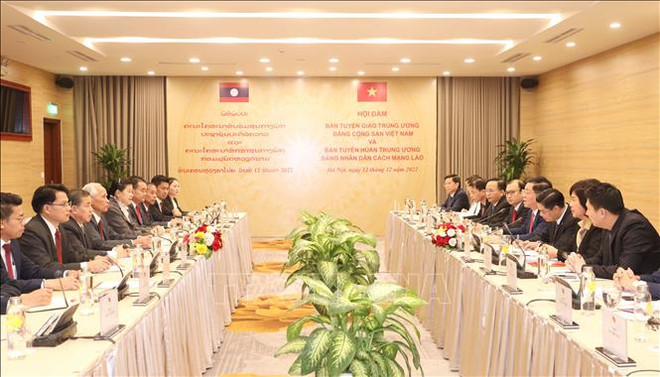 越南-老挝加强分享宣教工作经验 ảnh 1