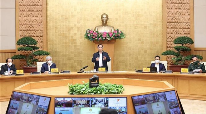 政府总理范明政:更好控制疫情 推动各项经济社会发展 ảnh 1 政府总理范明政:更好控制疫情 推动各项经济社会发展 ảnh 1