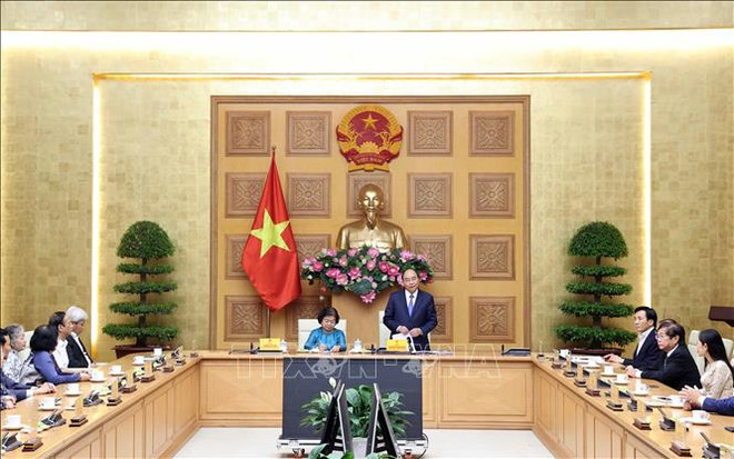 越南政府总理阮春福会见武阿丁助学基金会代表 ảnh 1 越南政府总理阮春福会见武阿丁助学基金会代表 ảnh 1