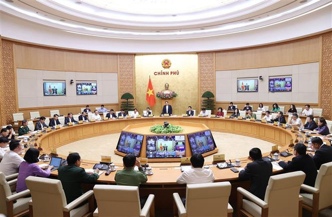 越南政府总理范明政主持召开全国政策宣传工作视频会议 ảnh 2 越南政府总理范明政主持召开全国政策宣传工作视频会议 ảnh 2