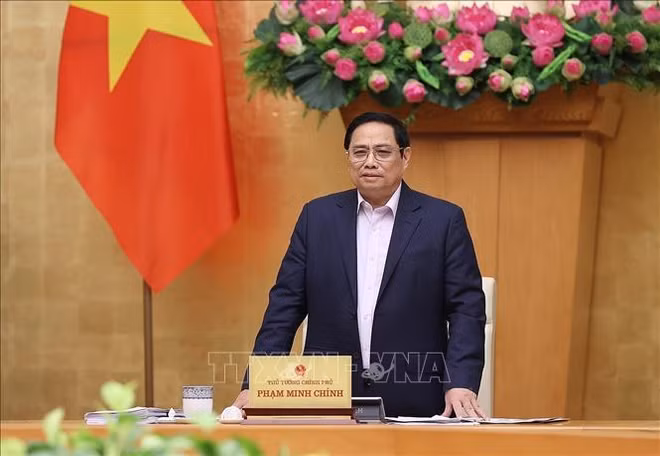 政府总理范明政：倾听并就新问题作出适当调整 ảnh 1