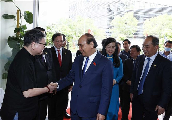 越南国家主席阮春福出席2021年第11届越南国际艺术摄影展 ảnh 1 越南国家主席阮春福出席2021年第11届越南国际艺术摄影展 ảnh 1