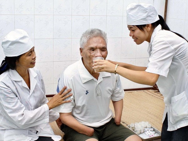 武德儋副总理会见富寿省和朔庄省革命有功者代表团 ảnh 1