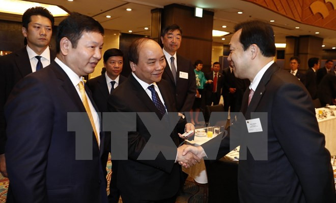 越南政府总理阮春福与日本信息技术企业举行座谈会 ảnh 1 越南政府总理阮春福与日本信息技术企业举行座谈会 ảnh 1