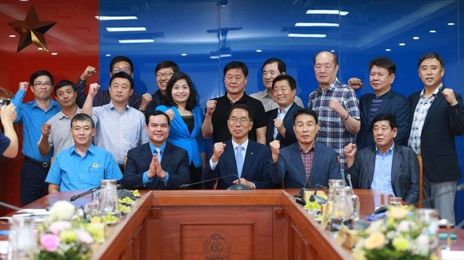越南劳动总联合会主席会见韩国工会联合会代表团 ảnh 2 越南劳动总联合会主席会见韩国工会联合会代表团 ảnh 2