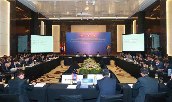 第18届柬老越三国禁毒合作部长级会议在河内举行 ảnh 3