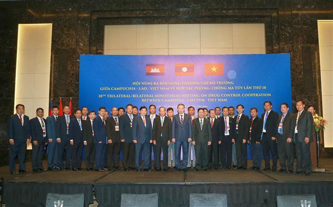 第18届柬老越三国禁毒合作部长级会议在河内举行 ảnh 1