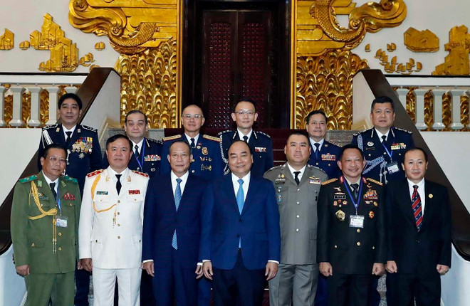 政府总理阮春福会见出席ASEANAPOL 39的各国代表团团长 ảnh 1 政府总理阮春福会见出席ASEANAPOL 39的各国代表团团长 ảnh 1
