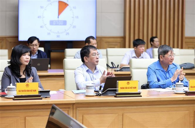 政府总理范明政:避免因公务员的不负责任和官僚作风而浪费时间、精力和资源 ảnh 2 政府总理范明政:避免因公务员的不负责任和官僚作风而浪费时间、精力和资源 ảnh 2