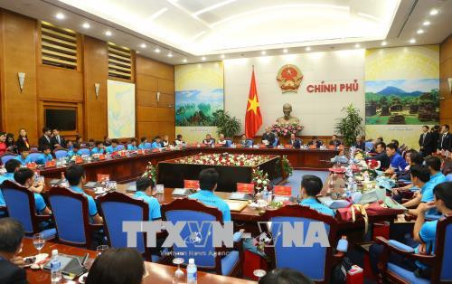 政府总理阮春福会见越南U23球队 授予球队一等劳动勋章 ảnh 2
