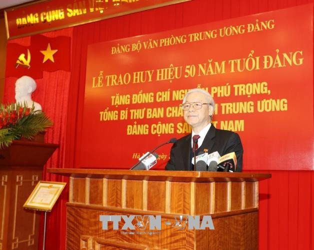 越共中央总书记阮富仲: 努力学习和践行胡伯伯榜样 无悔于越南共产党党员称号 ảnh 1 越共中央总书记阮富仲: 努力学习和践行胡伯伯榜样 无悔于越南共产党党员称号 ảnh 1