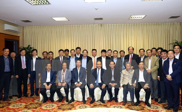 越南政府总理阮春福与国内新闻媒体机构领导举行见面会 ảnh 1