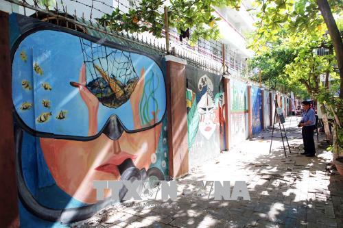 岘港市壁画之路完美竣工 ảnh 2 岘港市壁画之路完美竣工 ảnh 2