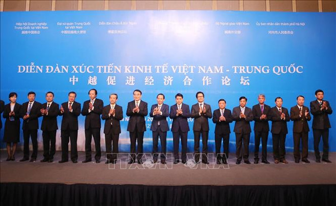 越中促进经济合作论坛在河内举行 ảnh 4 越中促进经济合作论坛在河内举行 ảnh 4