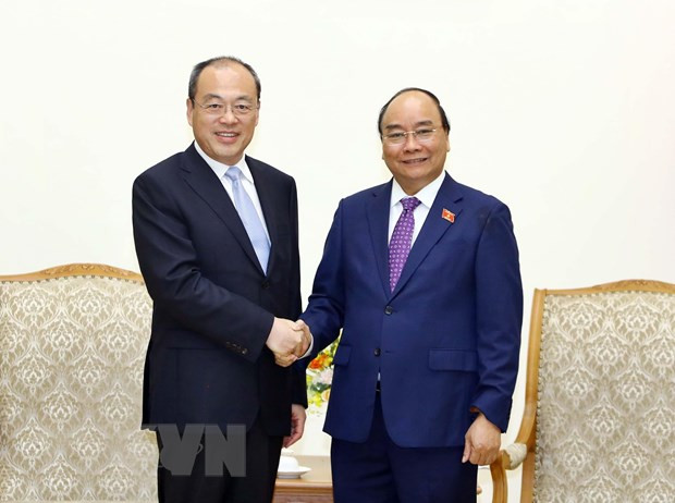 越南政府总理阮春福会见中国云南省省长阮成发 ảnh 1