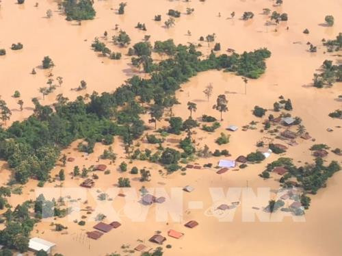 老挝一水电站大坝坍塌致19人死亡 韩国总统文在寅派救援队赴现场 ảnh 1 老挝一水电站大坝坍塌致19人死亡 韩国总统文在寅派救援队赴现场 ảnh 1