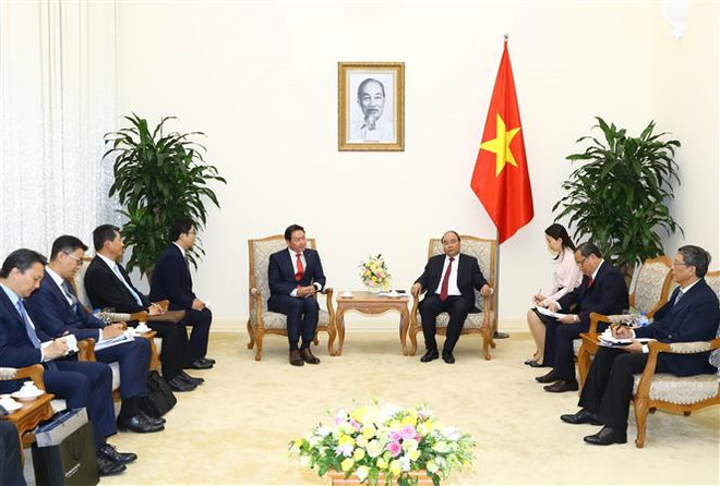 政府总理阮春福会见韩国SK集团董事长崔泰源 ảnh 1 政府总理阮春福会见韩国SK集团董事长崔泰源 ảnh 1